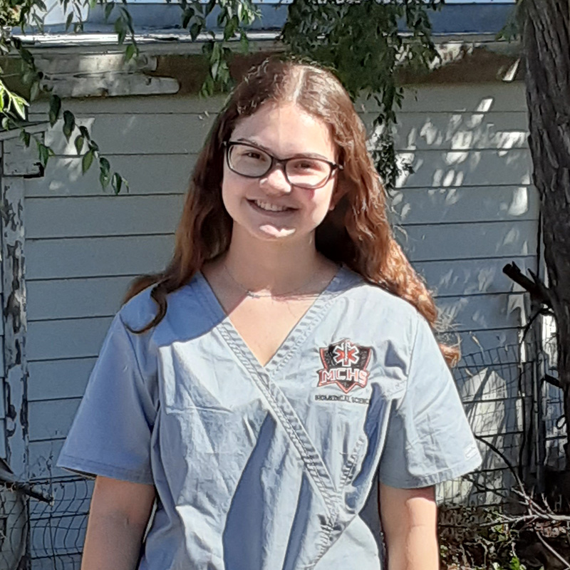 Megan Future Nurse in scrubs