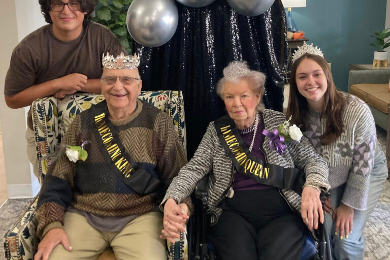 Honorary King and Queeen Joe Stanek and Shirley Klapperich pose with McHenry High School's 2025 Queen Kayra Hanneman and King Chase Miller.